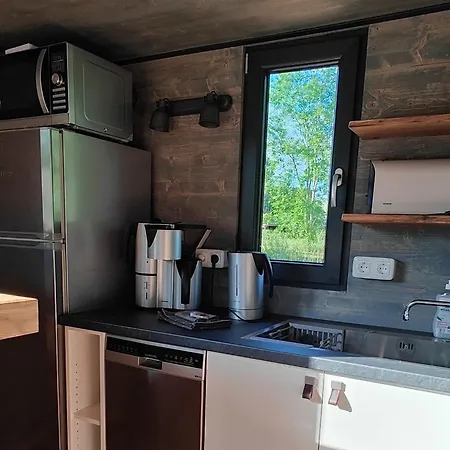 Spektakulaeres Tiny House Im Teich Mit Terrasse Und Kamin Feriehus